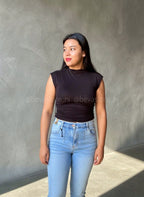 Top sólido sin mangas