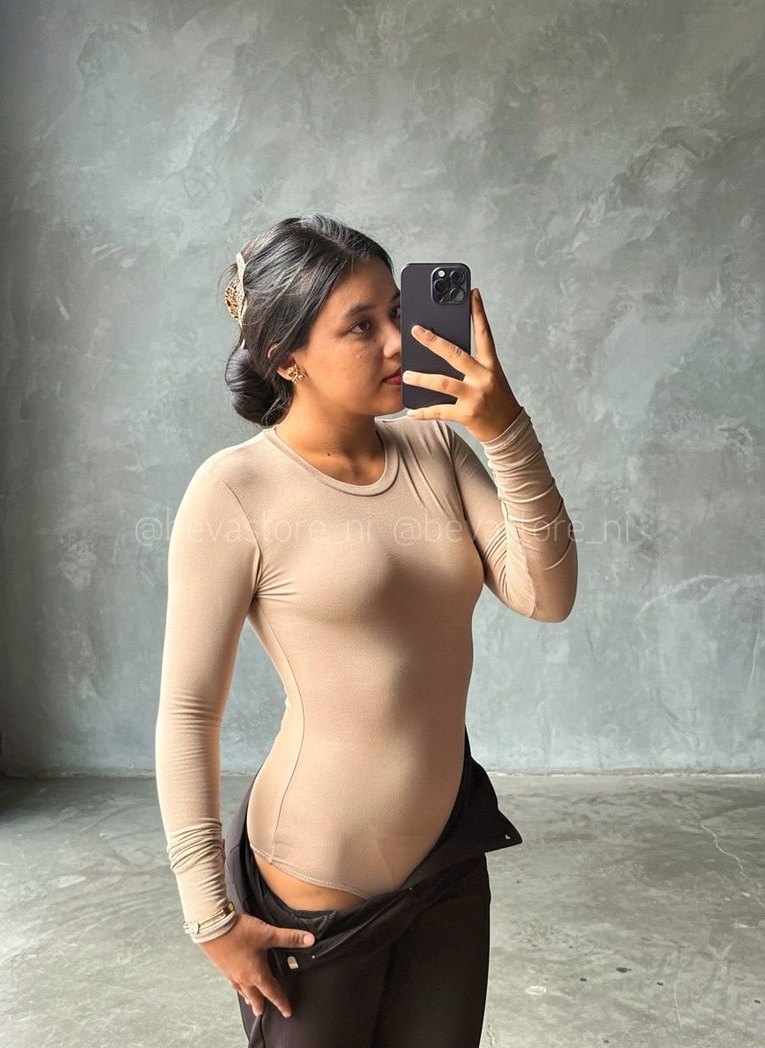 Bodysuit manga larga y cuello redondo