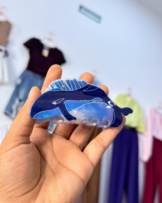 Pinza de cabello de ballena con bebé