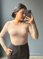 Bodysuit manga larga y cuello redondo