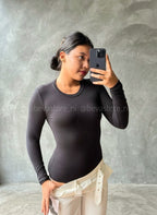 Bodysuit manga larga y cuello redondo