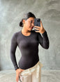 Bodysuit manga larga y cuello redondo