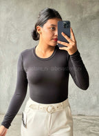 Bodysuit manga larga y cuello redondo