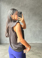 Blusa abotonada con volantes