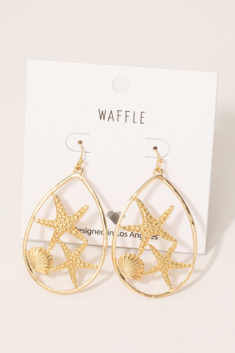 Aretes dorados estrellas de mar y concha