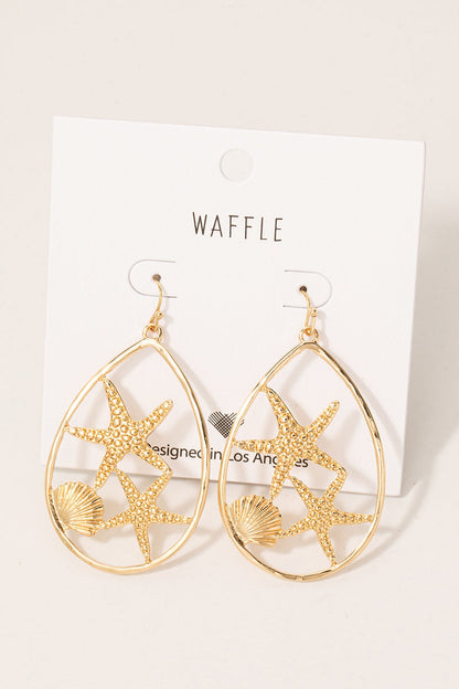 Aretes dorados estrellas de mar y concha