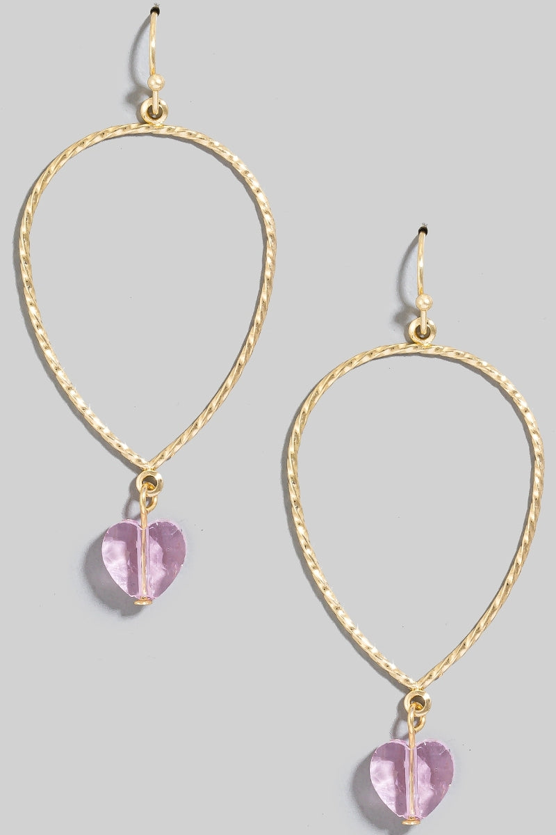 Aretes dorados con colgante de corazón