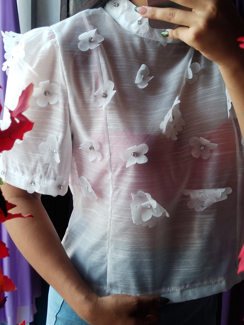 Blusa con flores 3D