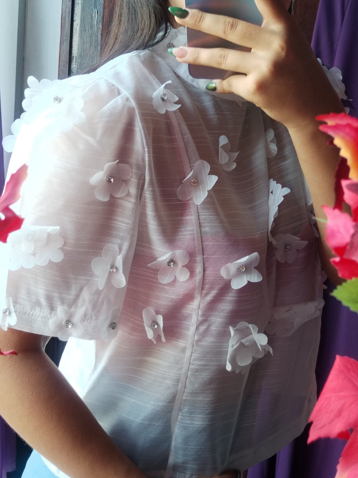 Blusa con flores 3D