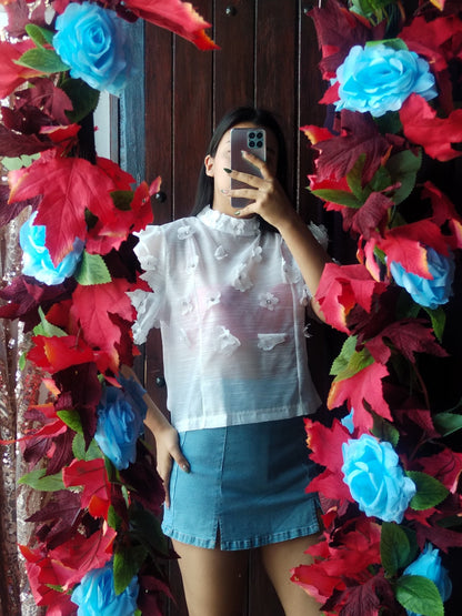 Blusa con flores 3D