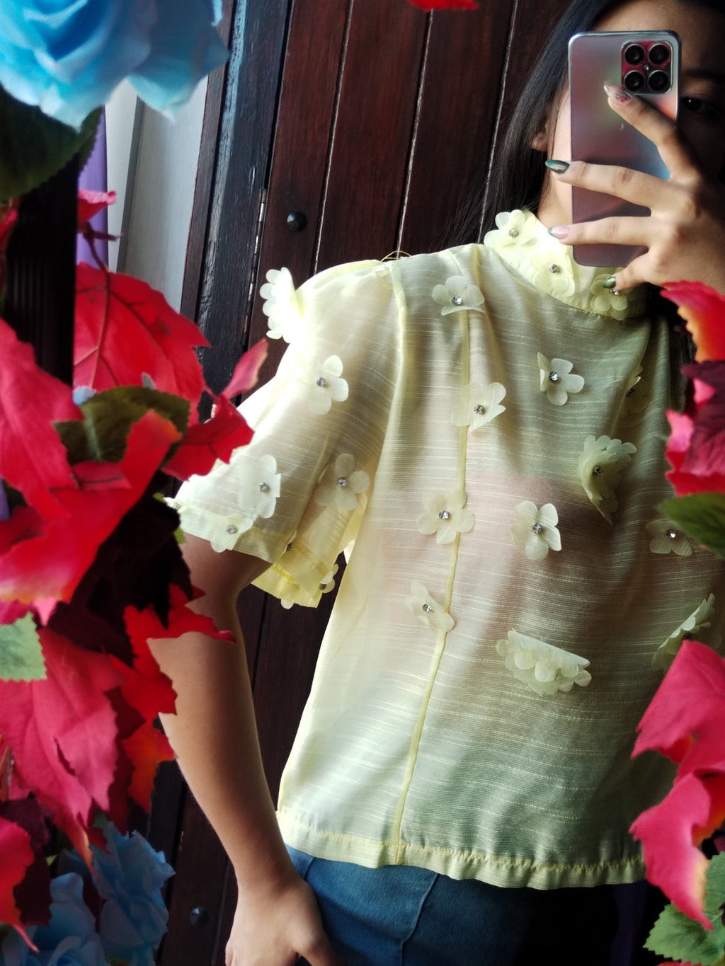 Blusa con flores 3D