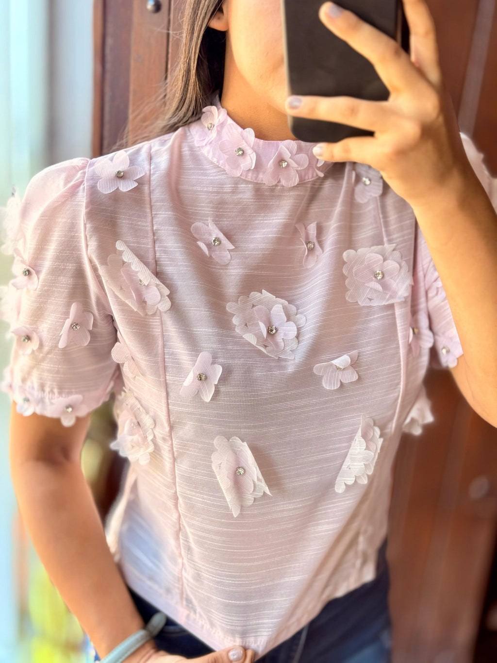 Blusa con flores 3D