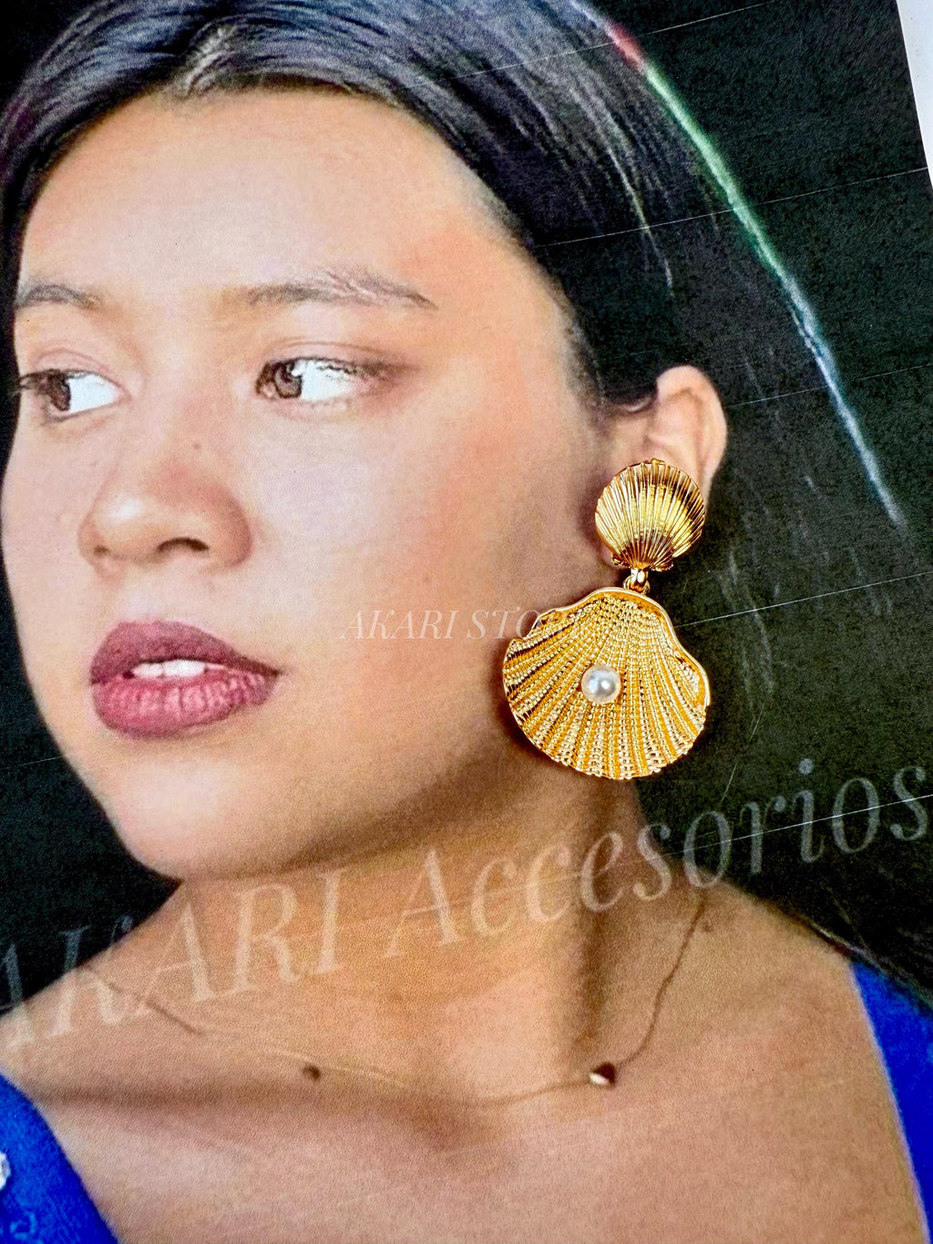 Aretes dorados Conchas de mar con perlas