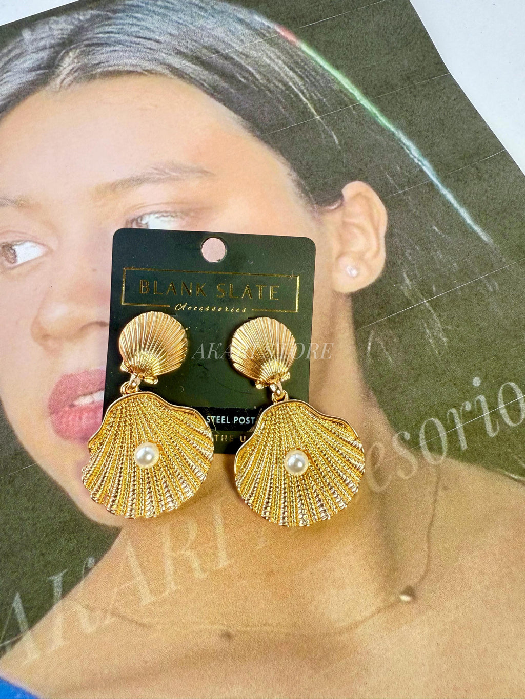 Aretes dorados Conchas de mar con perlas