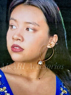 Aretes dorados con colgante de corazón