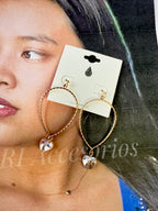 Aretes dorados con colgante de corazón