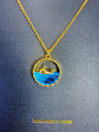 Cadena con Dije de Moneda con Delfín