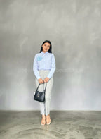 Looks blusa manga larga celeste con rosa 3D