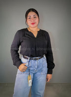 Blusa plisada de manga larga