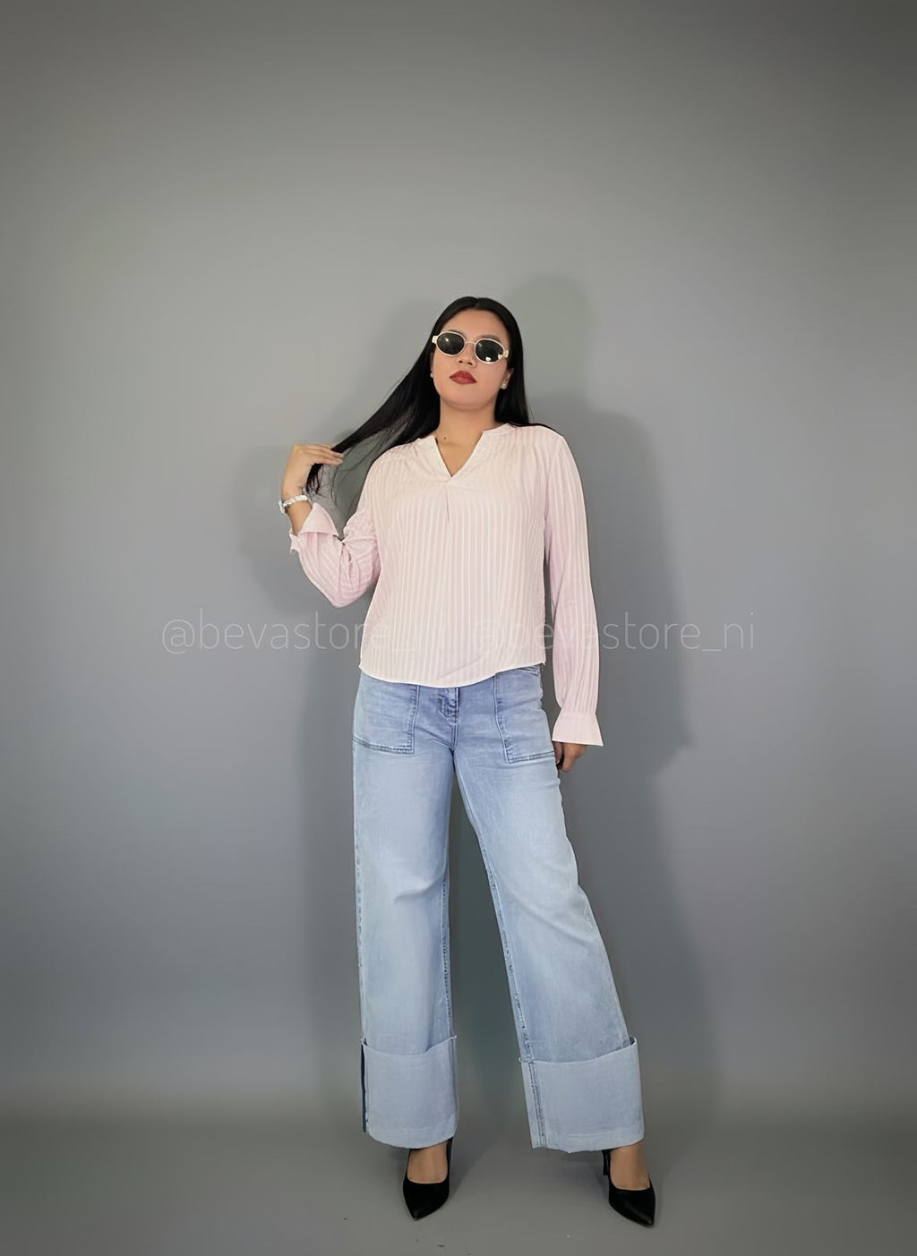 Blusa plisada de manga larga