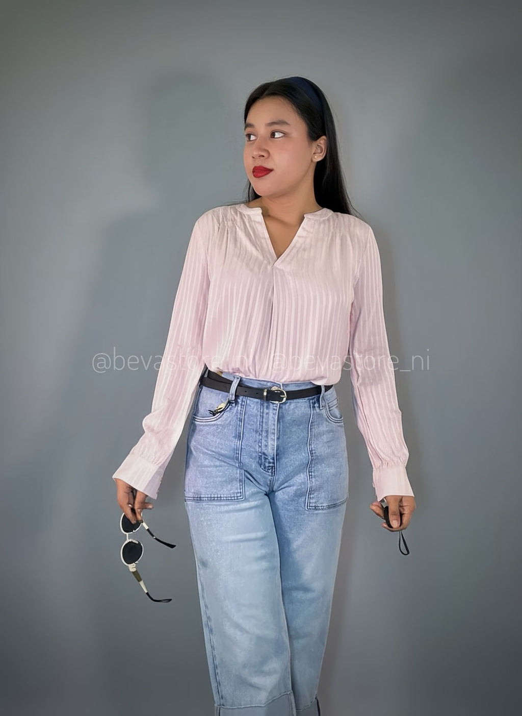 Blusa plisada de manga larga