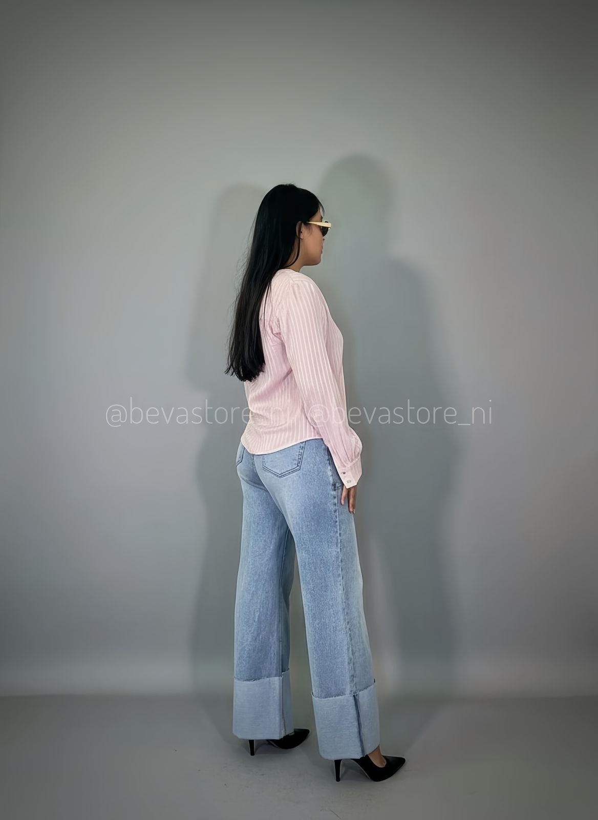 Blusa plisada de manga larga