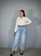 Blusa plisada de manga larga