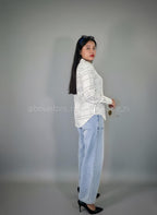 Camisa manga larga con cuello y estampado geométrico