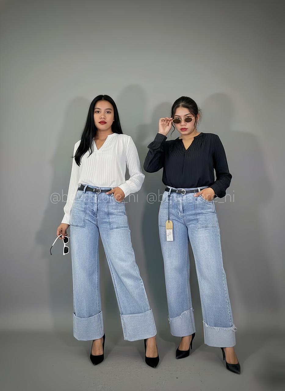 Blusa plisada de manga larga