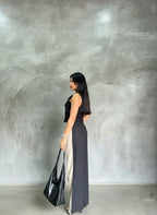 Look pantalón recto negro y crema