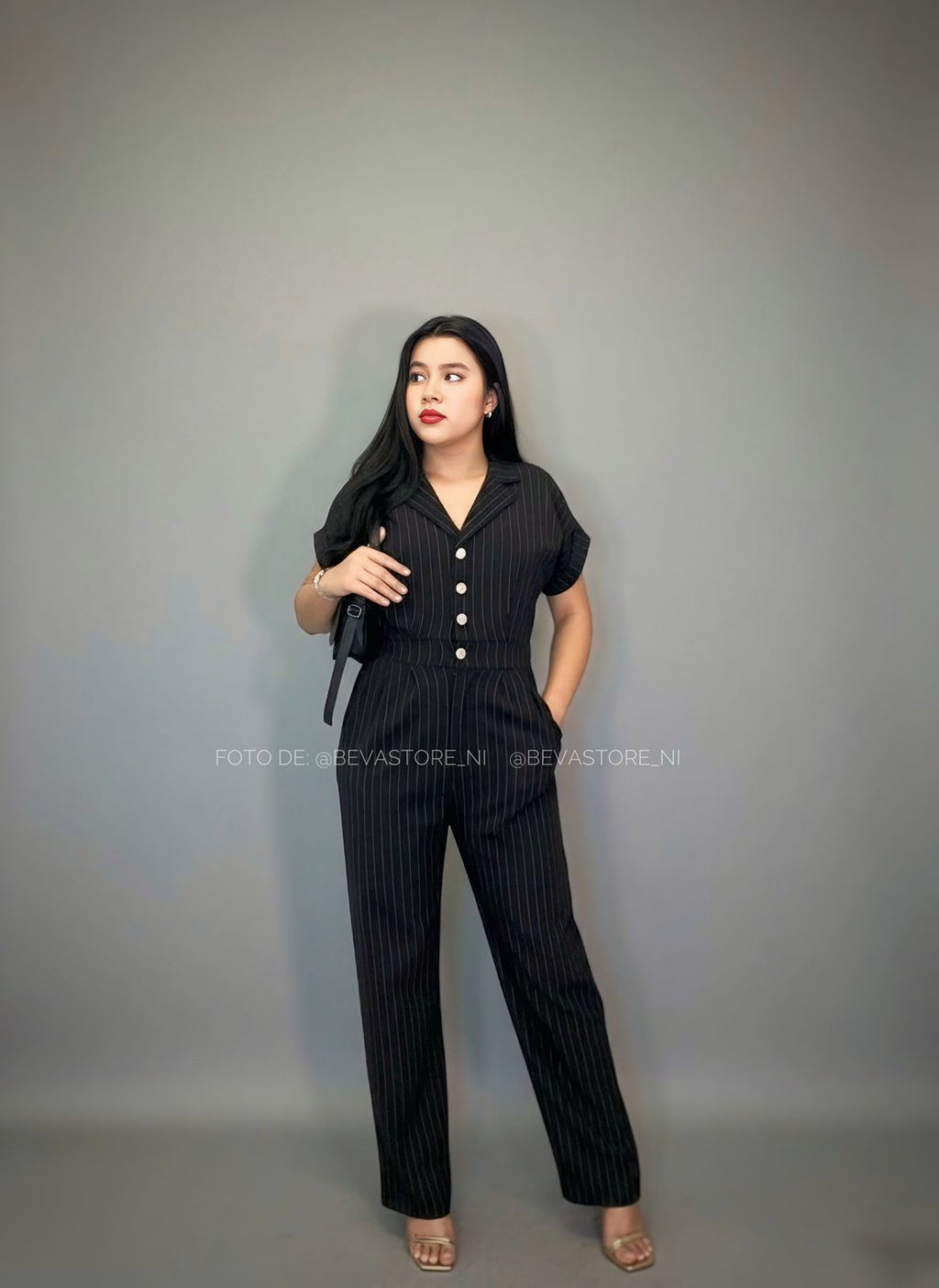 Enterizo Flare negro de rayas blancas