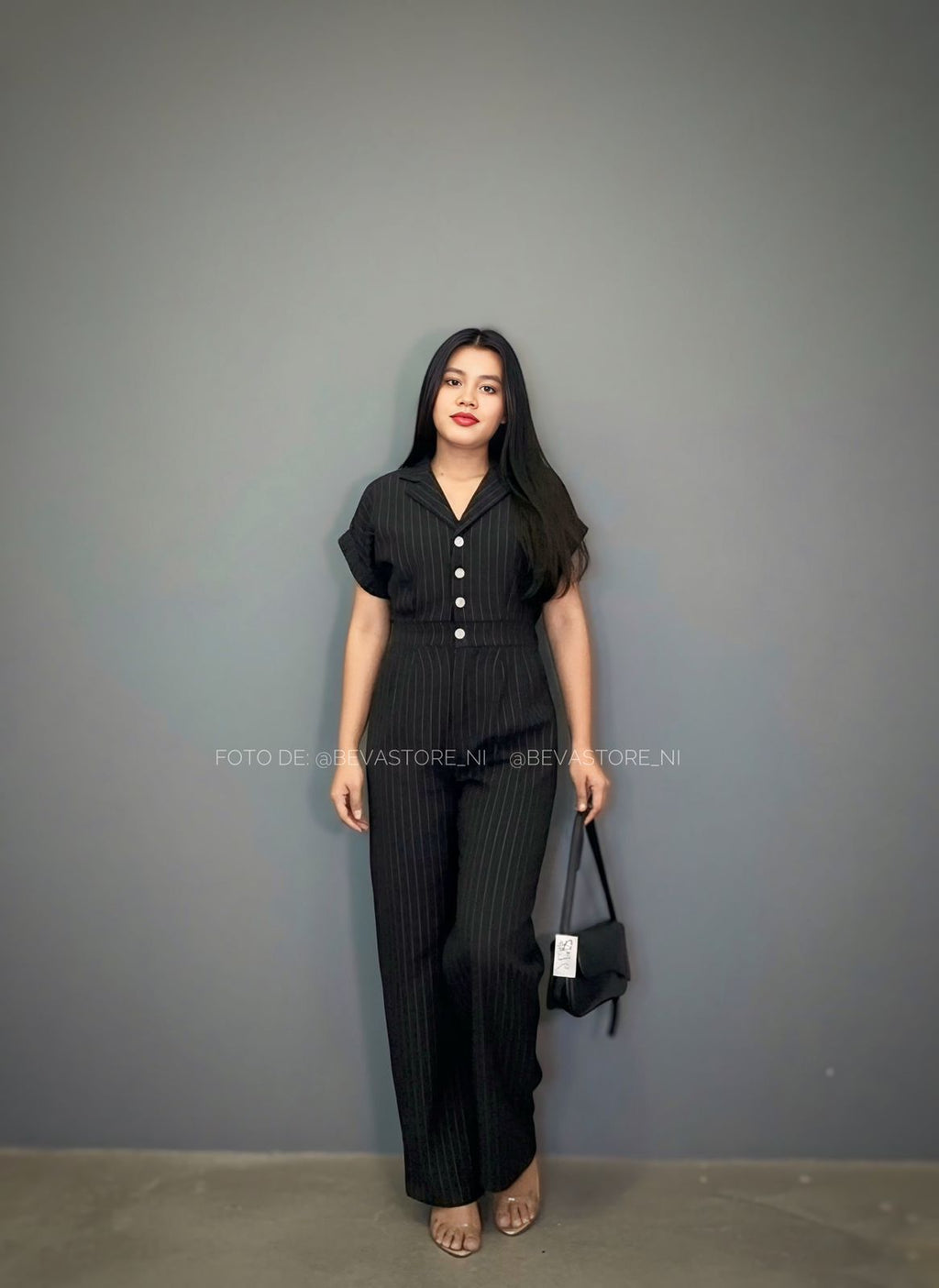 Enterizo Flare negro de rayas blancas