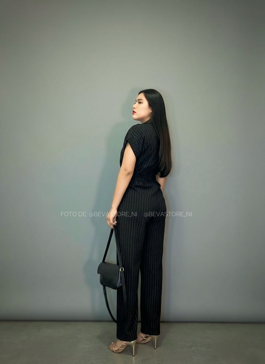 Enterizo Flare negro de rayas blancas