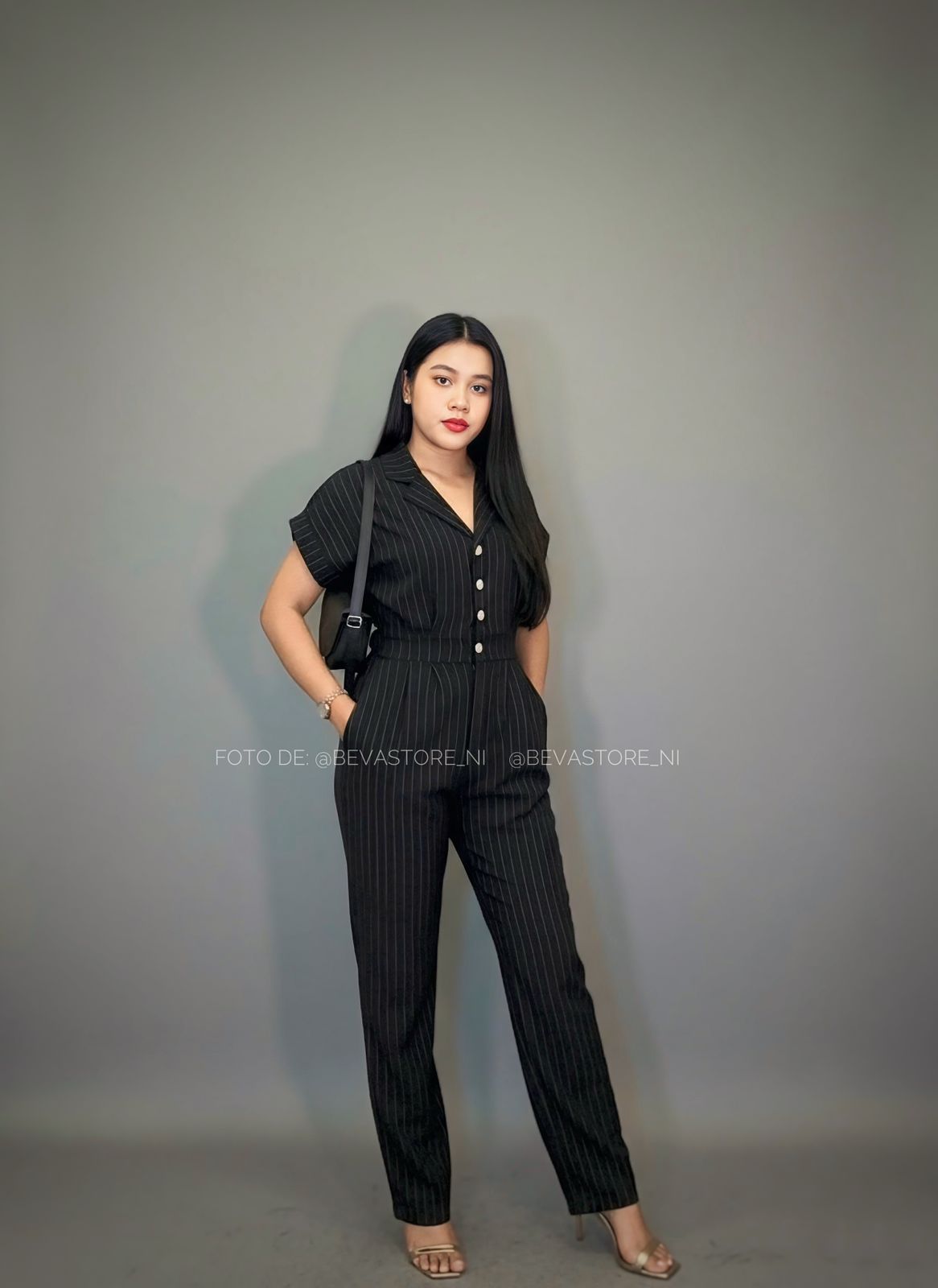 Enterizo Flare negro de rayas blancas