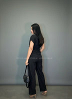 Enterizo Flare negro de rayas blancas