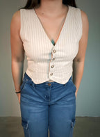 Chaleco rayado con lazo en la espalda