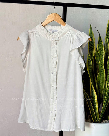 Blusa abotonada con volantes