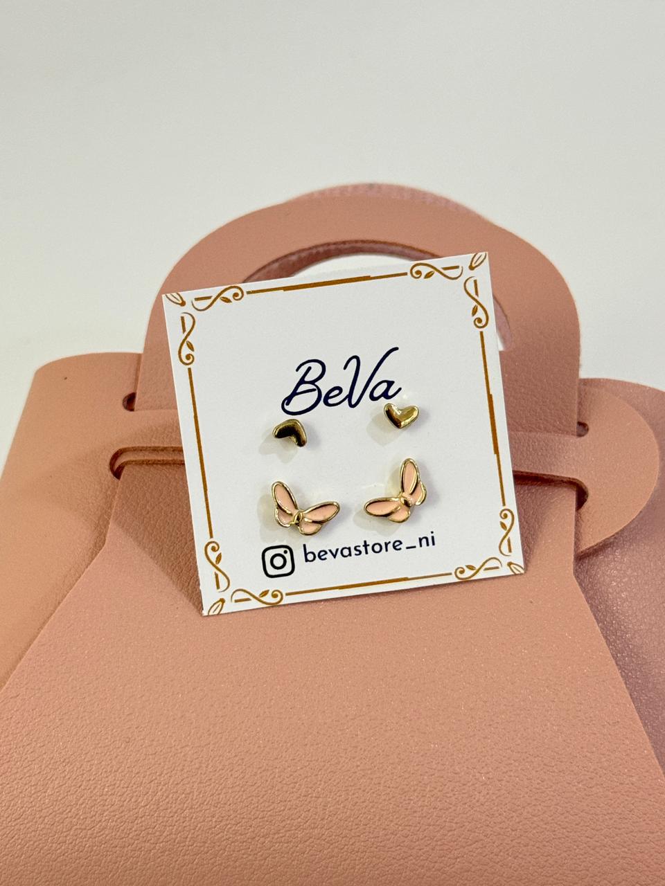 Aretes de corazón y mariposa dorados