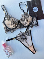 Lencería negra con bordado floral de malla