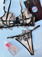 Lencería negra con bordado floral de malla