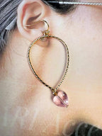 Aretes dorados con colgante de corazón