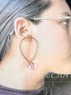 Aretes dorados con colgante de corazón