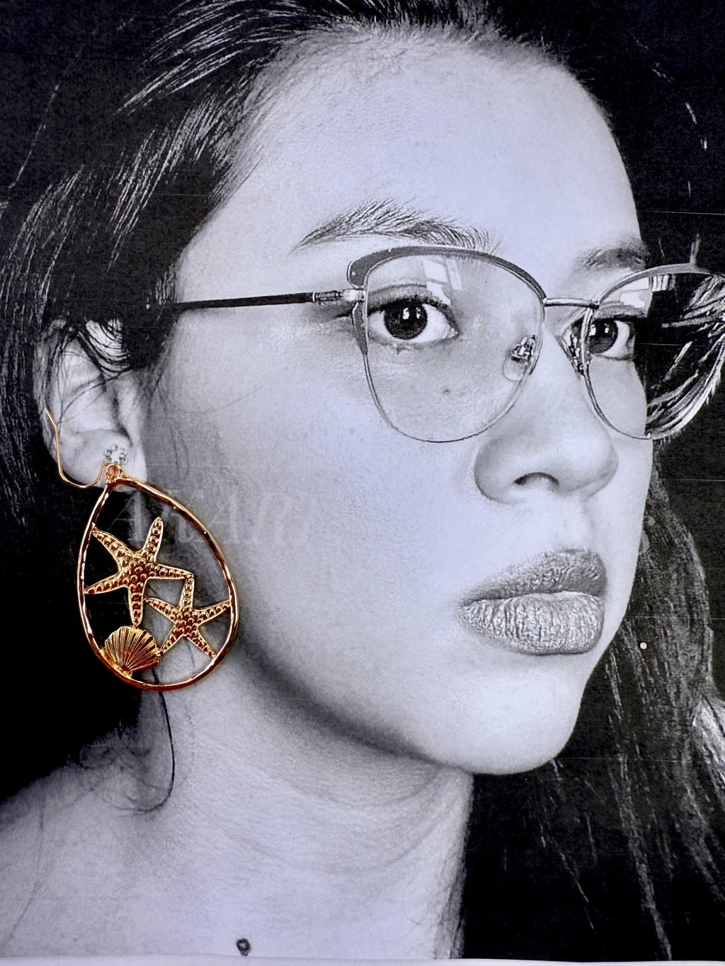 Aretes dorados estrellas de mar y concha