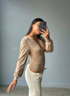 Bodysuit manga larga cuello en V